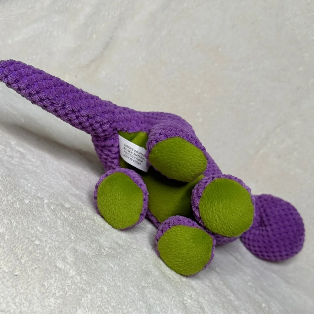 GoDog Bruto Purple Dinosaur Plush Dog Toy Silent Squeaker Chew Guard